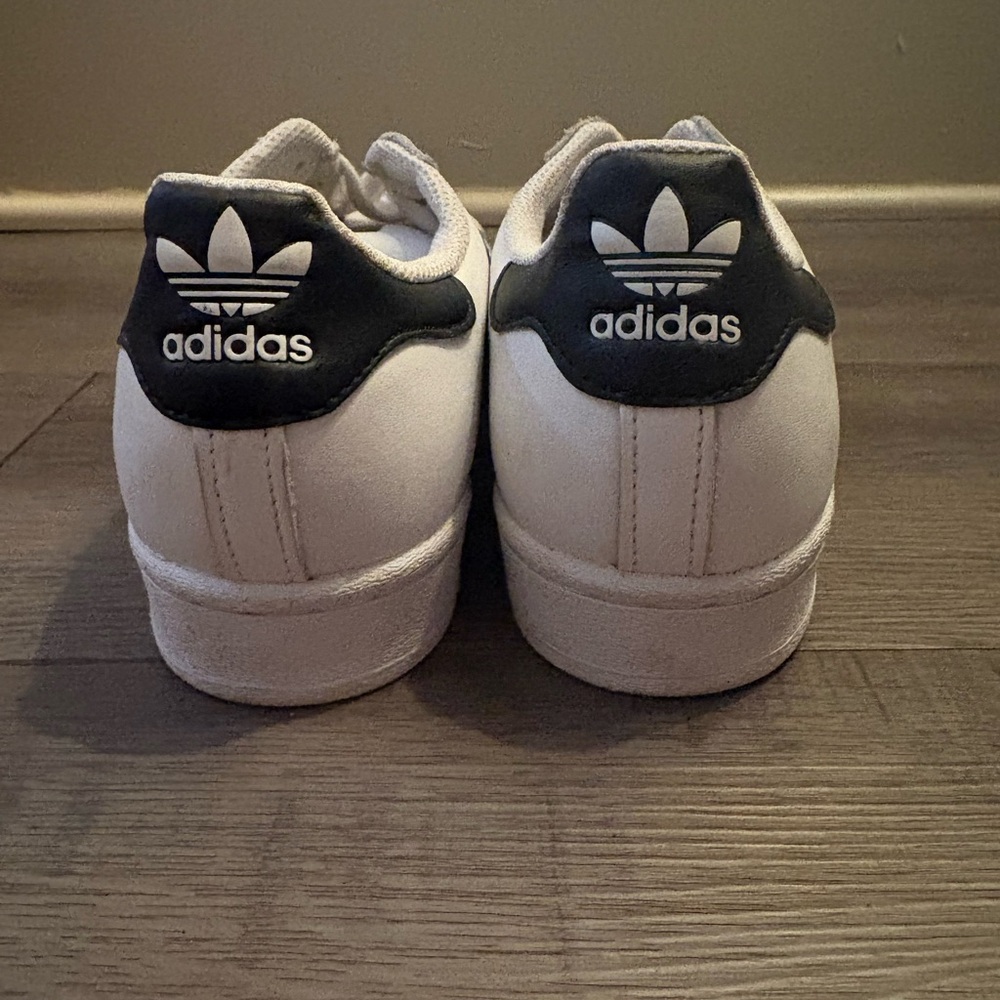 Adidas White and Black Shoes with Gold Logo